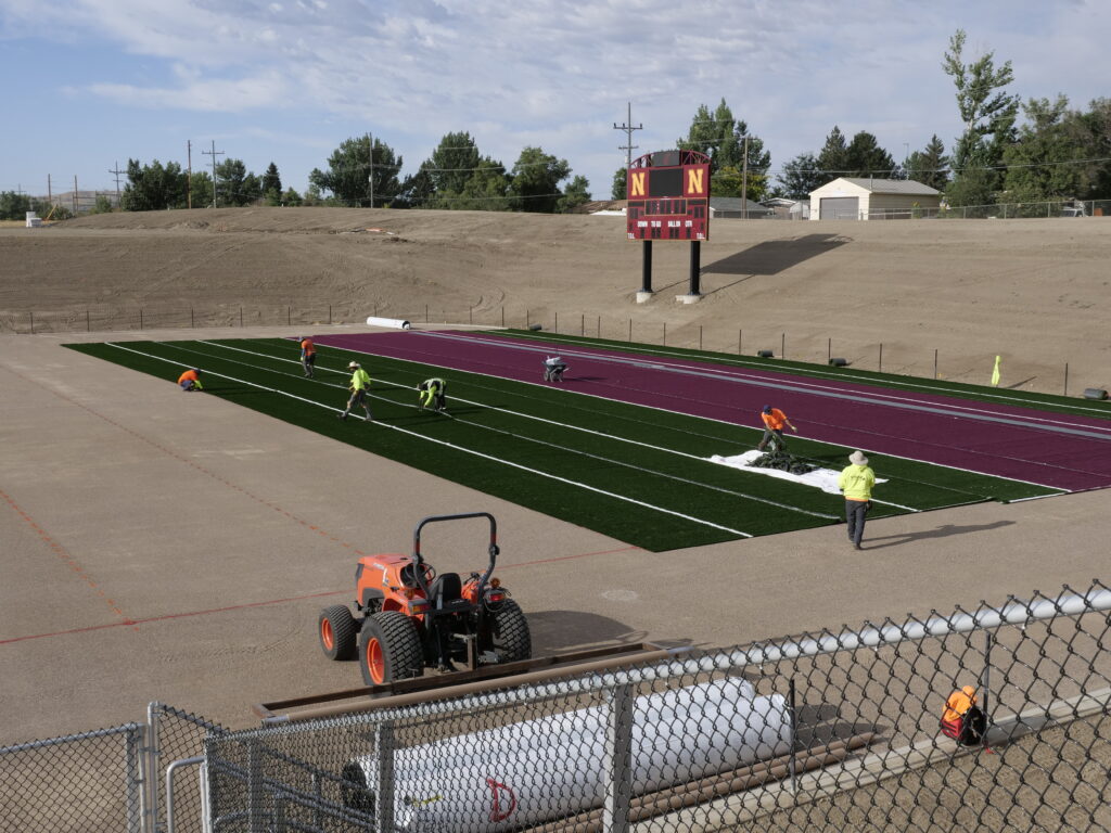 Rolling out the turf, August 2020